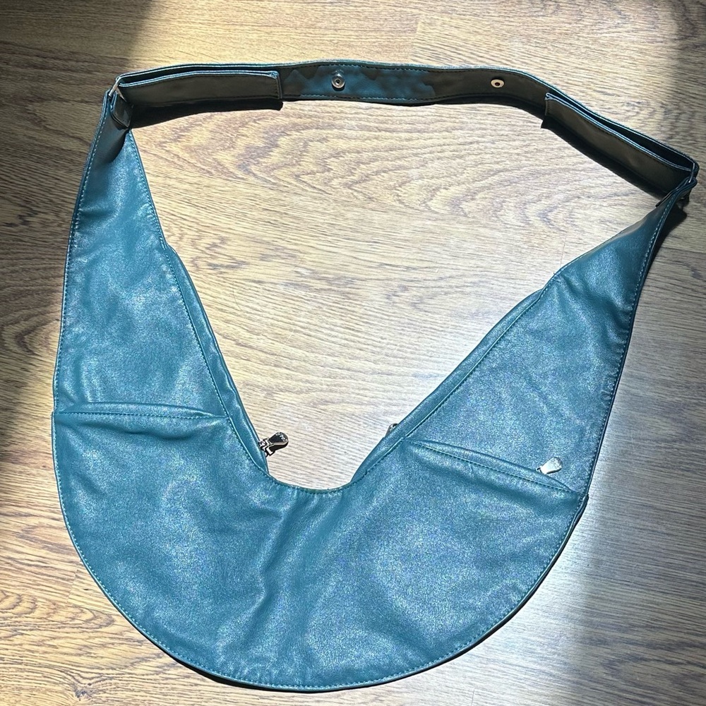 Sash faux leather crossbody sling bag.